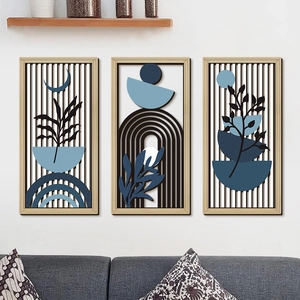 Three-piece bohemian wall art set featuring abstract blue leaves and geometric wooden frames