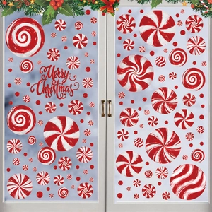Adesivi natalizi per finestre con caramelle rosse e scritte Merry Christmas su vetro
