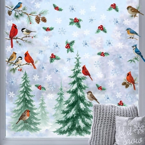 Christmas window stickers with red birds, pine branches and snowflakes for winter decor