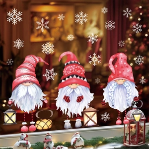 Pink Christmas gnome window clings and snowflakes for festive glass decoration