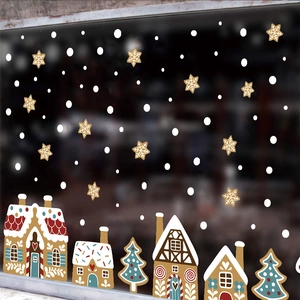 Christmas window stickers set with gingerbread houses, trees, and snowflakes decorations