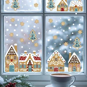 Christmas gingerbread house window stickers with snowflakes and festive trees on glass