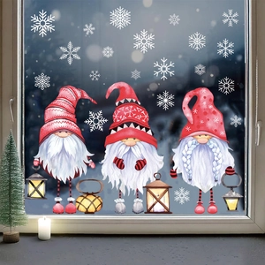 Pink Christmas gnome window clings with snowflakes on glass for holiday window decor