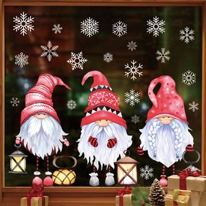 Christmas window stickers with pink gnomes and white snowflakes for festive glass decoration