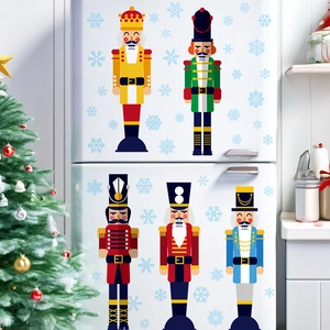 Nutcracker soldier wall stickers and snowflakes on a white fridge with Christmas tree