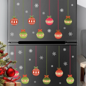 Christmas window stickers with festive red and green ornaments and white snowflakes décor