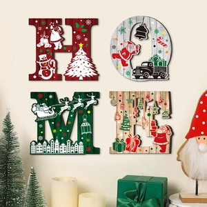 Close-up of wooden HOME letters featuring festive Santa and reindeer Christmas patterns
