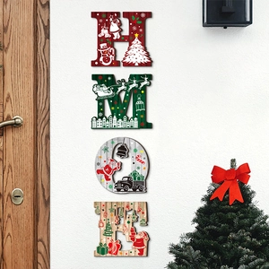 Detailed close-up of HOME wooden wall signs with Christmas character illustrations