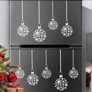 Stickers de Noël boules de neige blanches décoratifs sur fond de réfrigérateur noir