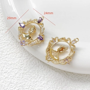 Macro view of vintage gold-plated relief pendant with purple zirconia, size 29x24mm