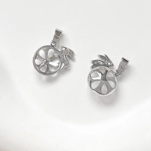 Detailed view of silver rabbit flower charm base for DIY jewelry making and pearl mounting