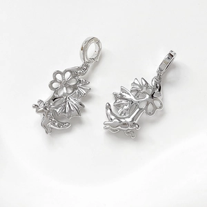 Detailed silver dragon and hollow flower charms for DIY jewelry making and craft projects
