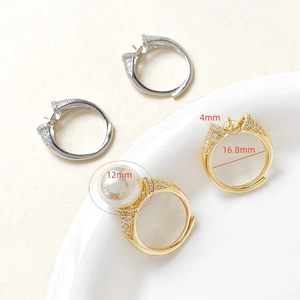 Detail of adjustable 18k gold plated ring base with cubic zirconia and dimension labels