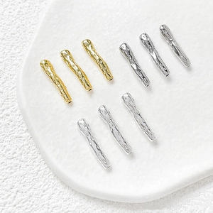 Detailed view of 14k gold-plated irregular branch tubes for DIY jewelry making