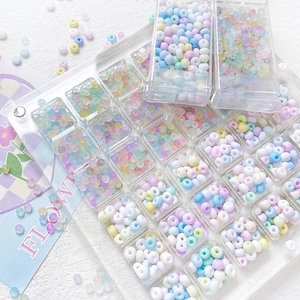 Colorful macaron glass seed beads set in transparent organizer box for DIY jewelry making