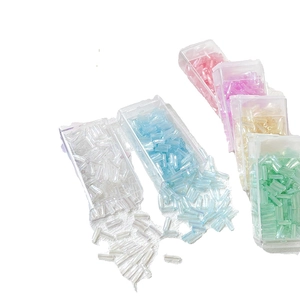 Pastel 6mm glass bugle beads for DIY jewelry making in a plastic storage box