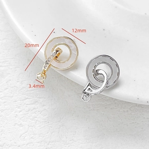 Macro view of 18k gold plated earring settings with white shell inlay and measurements