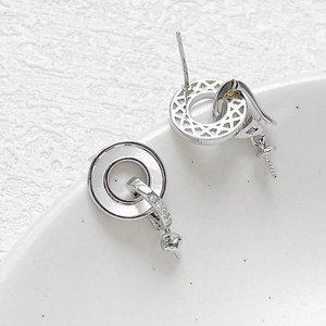 Macro view of S925 silver double-circle earring settings with mop and pearl cup components