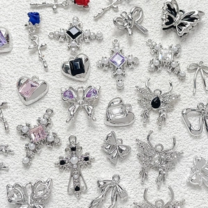 Silver alloy charms with butterfly and cross designs featuring colorful gemstones for DIY jewelry