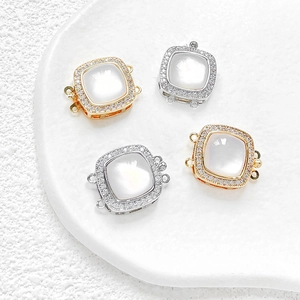 Gold and silver square jewelry clasps with white shell inlay and sparkling micro pavé