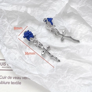 Detail of blue rose floral charms with silver stems and 36mm length measurements
