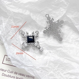 Detail showing vintage silver cross pendant with black gem and pearls, size 22mm x 29mm