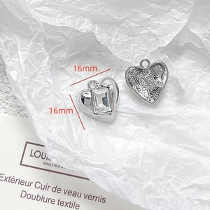 Silver heart pendant with crystal detail and 16x16mm dimensions for jewelry making