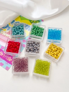 Colorful 4mm frosted glass beads in transparent square containers for DIY jewelry