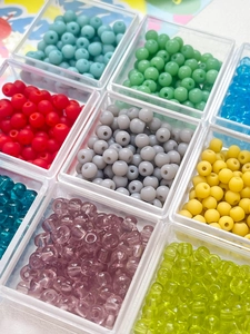 Macro shot of 4mm frosted glass seed beads in assorted colors for DIY jewelry making