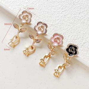 Macro detail of camellia pearl clasps with 18k gold plating and zircon inlay dimensions