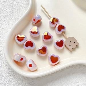 Macro detail of lavender translucent heart acrylic beads for DIY jewelry and crafts