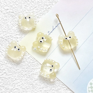 Detailed view of yellow crystal crab beads showing DIY through-hole design for jewelry