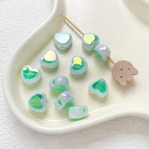 Iridescent green heart-shaped acrylic beads with side holes for DIY jewelry making