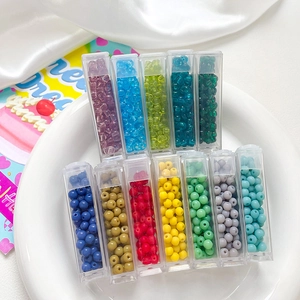 12-color 4mm frosted glass seed bead set in a clear plastic organizer for DIY jewelry