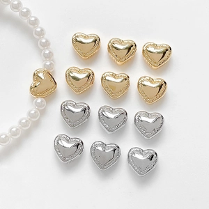 Polished 14k gold heart spacers and silver beads for DIY bracelet jewelry making