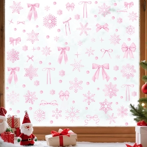 Adesivi natalizi rosa con fiocchi e fiocchi di neve per decorazione festiva di finestre