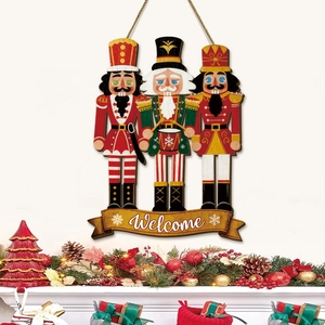 Close-up of wooden Christmas nutcracker welcome sign hanging on a festive mantel