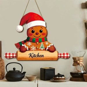Panneau de porte de cuisine bonhomme de pain d'épices en bois avec bonnet de Noël rouge