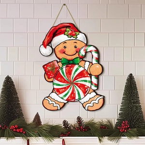 Détail de la décoration murale bonhomme pain d'épice avec motifs de bonbons de Noël