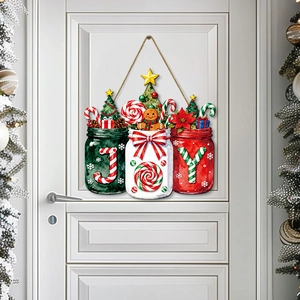Plaque de porte de Noël JOY en bois avec bonhomme de pain d'épices sur porte blanche
