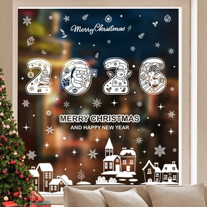 White 2026 Christmas window stickers showing snowman and snowflakes on glass