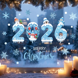 Close-up of 2026 Christmas window stickers with snowmen and Merry Christmas decals