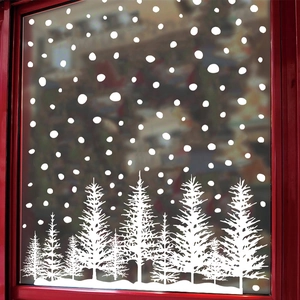 White Christmas window decals with forest pine trees and falling snow dots for winter decor