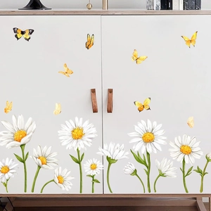 White daisy and yellow butterfly PVC wall stickers for home decor on white cabinet