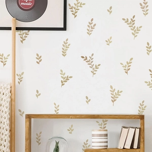 Elegant gold eucalyptus leaf wall stickers for a modern minimalist living room decor