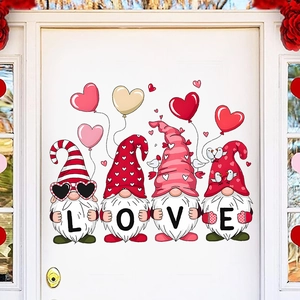 Close-up of Valentine Gnomes holding LOVE letters wall decals on a white door