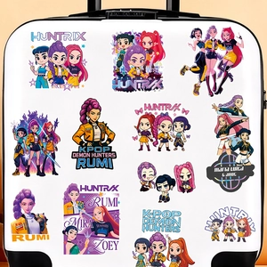 Detailed view of anime girl character stickers applied on a white travel suitcase