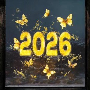 Detail der goldenen 2026 Fensterbilder mit glitzernden Schmetterlingen auf dunklem Glas