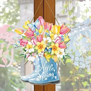 Spring welcome door sign featuring blue polka dot rain boots with colorful garden flowers