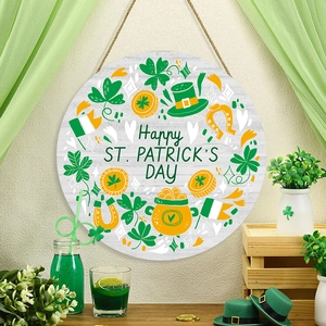 Detail of St. Patrick's Day round wooden sign with clovers on a textured wall